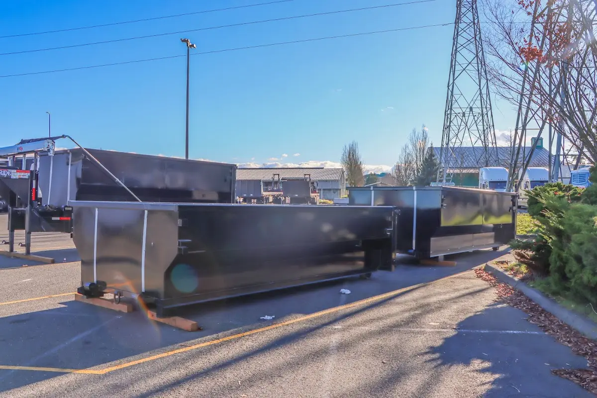 Roll-off dumpster ready for waste disposal at job site for Yard Waste Dumpster Rental in Clemson